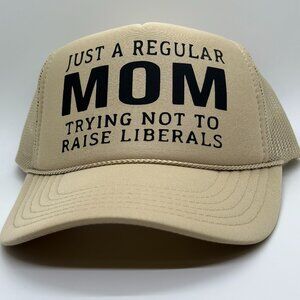 **NEW** JUST A REGULAR MOM TRYIN G NOT TO RAISE LIBERALS trucker hat